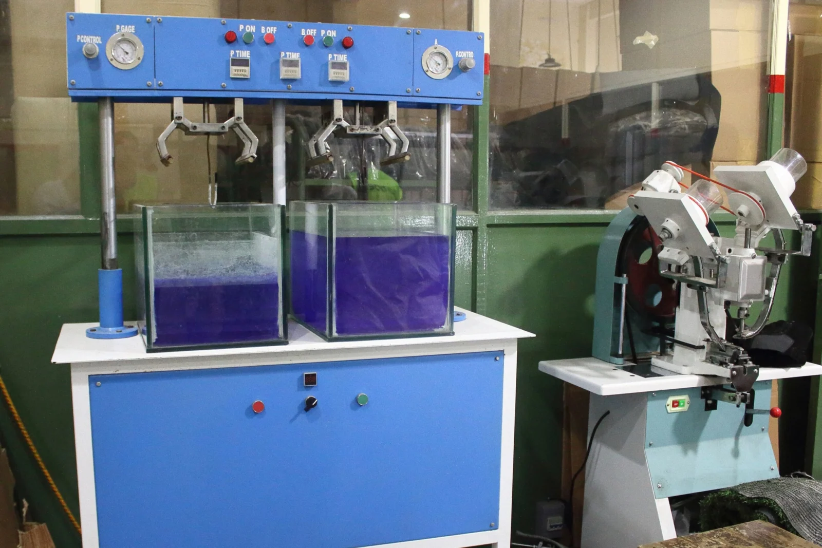 Footwear testing equipment with water tanks